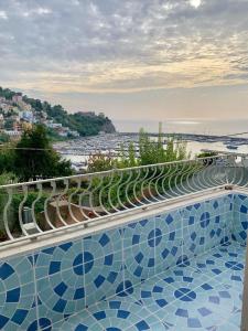 a view of a swimming pool on top of a building at Mille tramonti Agropoli sunset suite in Agropoli
