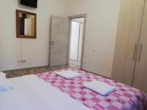 Postel nebo postele na pokoji v ubytování Venice View Guesthouse