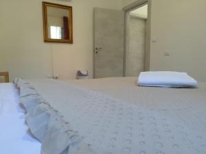 Postel nebo postele na pokoji v ubytování Venice View Guesthouse