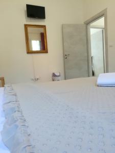 Postel nebo postele na pokoji v ubytování Venice View Guesthouse