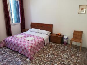 Postel nebo postele na pokoji v ubytování Venice View Guesthouse