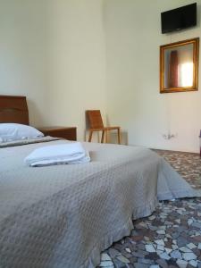 Postel nebo postele na pokoji v ubytování Venice View Guesthouse