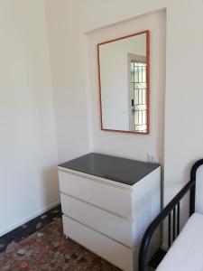Postel nebo postele na pokoji v ubytování Venice View Guesthouse