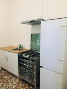 Kuchyň nebo kuchyňský kout v ubytování Venice View Guesthouse