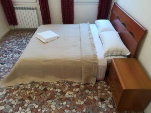 Postel nebo postele na pokoji v ubytování Venice View Guesthouse