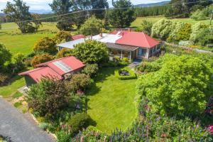 an aerial view of a house with a garden at Hamlet Downs Country Accommodation in Fentonbury