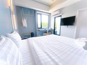 ABIZZ Hotel KwanPhayao客房内的一张或多张床位