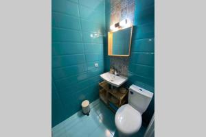 A bathroom at Seaview dreamy apartment with a pool and garden