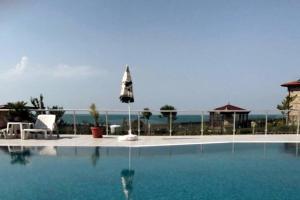 The swimming pool at or close to Seaview dreamy apartment with a pool and garden