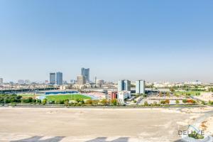 Gallery image of Sunny 1BR at Canal Residences West Dubai Sports City by Deluxe Holiday Homes in Dubai