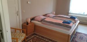 Postel nebo postele na pokoji v ubytování Ferienwohnung Parkstraße