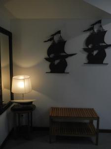 a room with a wall with bats on the wall at Hostal Vila del Mar in Lloret de Mar