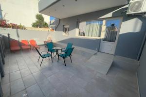A balcony or terrace at Maxim Deluxe Apartment