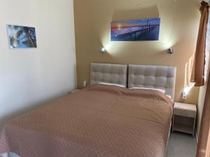 Кровать или кровати в номере Samothraki Akrogiali Rooms
