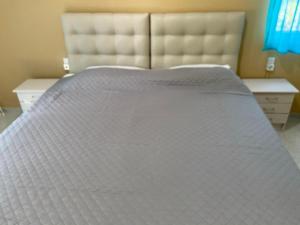 Кровать или кровати в номере Samothraki Akrogiali Rooms