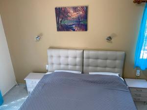 Кровать или кровати в номере Samothraki Akrogiali Rooms