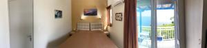 Кровать или кровати в номере Samothraki Akrogiali Rooms