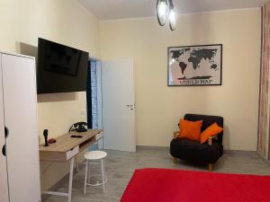 Televisyen dan/atau pusat hiburan di Alloggio Turistico Eco Home
