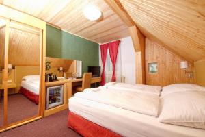 Ein Bett oder Betten in einem Zimmer der Unterkunft Penzion Stopa