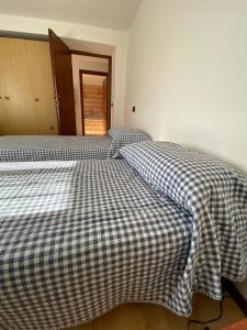 Säng eller sängar i ett rum på Il Casale del Miele