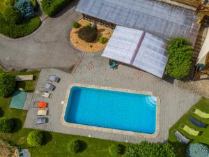an overhead view of a swimming pool with solar panels at Apartmány U Srdce Vltavy in Horní Planá