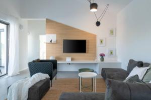 TV a/nebo společenská místnost v ubytování Villa Mateo with heated pool