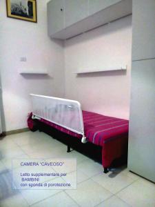 A bed or beds in a room at A un Passo dai Sassi