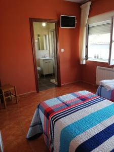 Łóżko lub łóżka w pokoju w obiekcie O Encontro