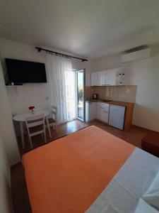Postel nebo postele na pokoji v ubytování Apartments Čobanov