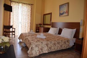 Postel nebo postele na pokoji v ubytování Sofia Hotel