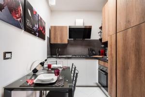Kuchyň nebo kuchyňský kout v ubytování Sun Terrace Appartment