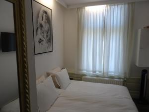 Postel nebo postele na pokoji v ubytování Emma's B&B