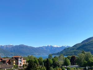 a view of the lake and mountains at Casa Elvy Al Lago in Cannobio