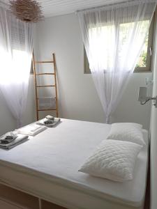 Posteľ alebo postele v izbe v ubytovaní Casa Horizon