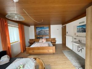 Kuchyň nebo kuchyňský kout v ubytování Appartements Alpenblick + 34 fotografií
