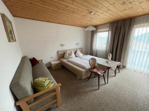 Postel nebo postele na pokoji v ubytování Appartements Alpenblick