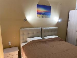 Кровать или кровати в номере Samothraki Akrogiali Rooms