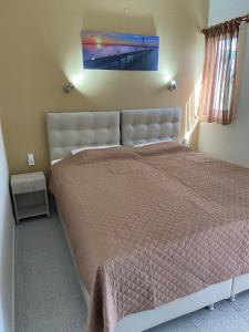 Кровать или кровати в номере Samothraki Akrogiali Rooms