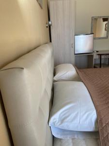 Кровать или кровати в номере Samothraki Akrogiali Rooms