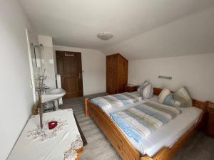 Postel nebo postele na pokoji v ubytování Appartements Alpenblick