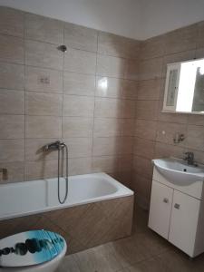 Kúpeľňa v ubytovaní Evris House oasis + 20 fotografií