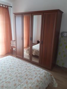 Postel nebo postele na pokoji v ubytování Apartments Makaus