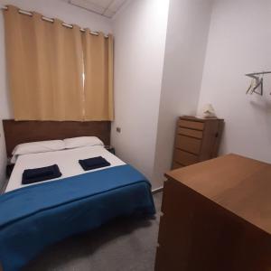 Posteľ alebo postele v izbe v ubytovaní Habitaciones La MAR