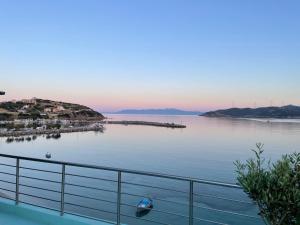 a view of a body of water with a boat in it at Thalassa view in Áyioi Apóstoloi