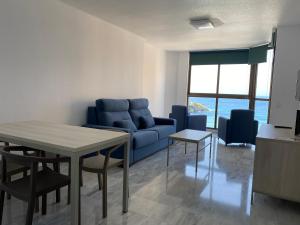 Predel za sedenje v nastanitvi Apartamentos Oasis Benidorm