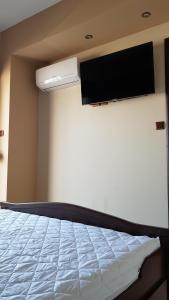 A bed or beds in a room at Luxury penthouse with sea view