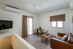 TV a/nebo společenská místnost v ubytování Remezzo Aqua Blue Maisonette