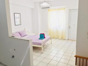 A bed or beds in a room at Korona beach apartments III