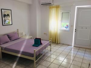 A bed or beds in a room at Korona beach apartments III