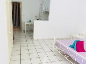 A bed or beds in a room at Korona beach apartments III